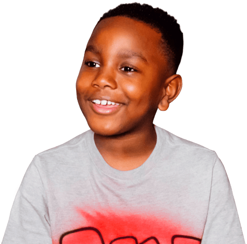 3rd grade boy with gray shirt on smiling