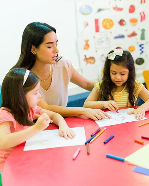 teacher-with-students-4x5