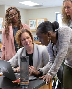 teachers-collaborating-in-science-room-4x5